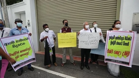 Rights groups protest in Colombo over killing of Sri Lankan worker in Pakistan,  Stock Footage 204089024