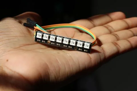 Rigid addressable LED strip or WS2812B 8 bit bar with soldered jumper cables Stock Photos