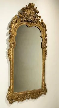 Rijksmuseum, 16th-20th ct, . Rectangular mirror in a list of gold-plated lion Stock Photos