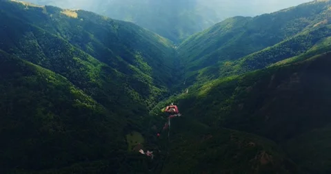 Rila Monastery Hidden In A Vast Mountain Valley Lit By Vibrant Sunrays On A Hot Stock Footage 300446589