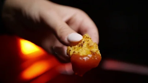 Rilled wings in the foreground. Selective focus on delicious chicken meat baked  Video stock 127541867