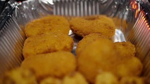 Rilled wings in the foreground. Selective focus on delicious chicken meat baked  Stock Footage 127541899