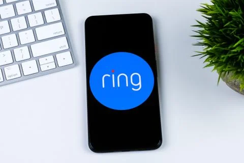 Ring app logo on a smartphone screen Stock Photos