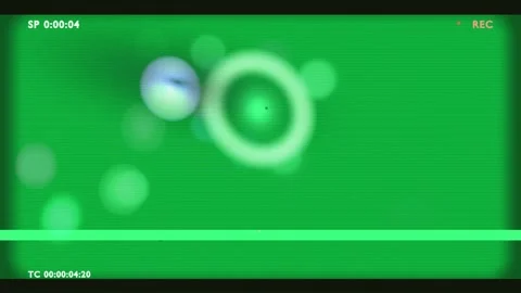 Ring appearing, drifting right, overlapping orbs; red REC flashing, evoking Stock Footage 340269512