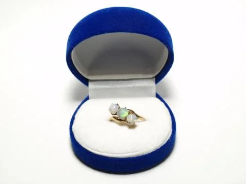 Ring in a blue box Stock Photos