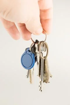 Ring of bound keys to a door lock isolated Stock Photos