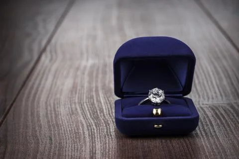 Ring in the box on the table Stock Photos