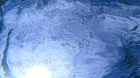 Ring bubble by freediver and sunlight underwater in blue ocean. Stock Footage 338333541