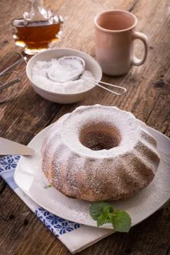 Ring cake, sugar and maple syrup Stock Photos