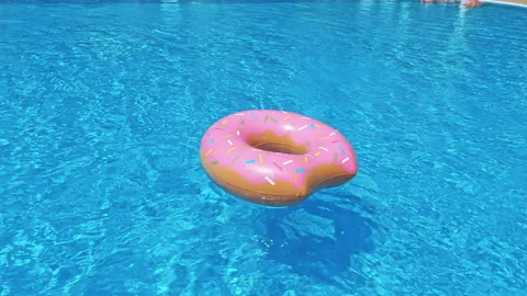Ring float in blue swimming pool Stock Footage 95726350