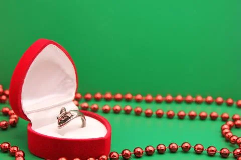 Ring in the form of a mouse in a gift red case. Symbol of the new year 2020. Stock Photos