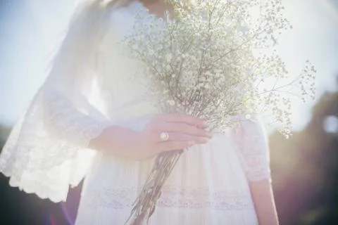 Ring on hand of bride Stock Photos