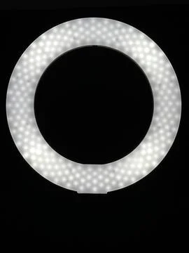 Ring lamp on black background Stock Photos