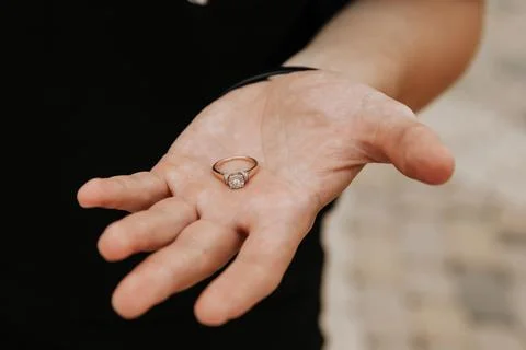 Ring on the palm of the hand Stock Photos