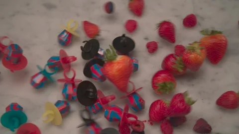 Ring Pops Slide on Table and Crash with Assorted Fruits HD Video Stock Footage 92368825