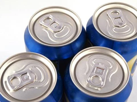 Ring pulls on the tops of drink cans. Stock Photos