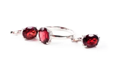 Ring with the red ruby stone isolated on white 스톡 사진