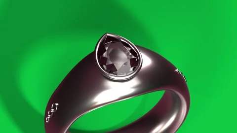 Ring rotating from glint, camera orbiting showcasing bezel, pear gem and Stock Footage 339198080
