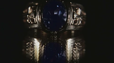 Ring with Sapphire on black Stock Footage 56473704