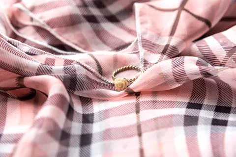 Ring on scarf Stock Photos