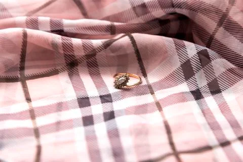 Ring on scarf Stock Photos