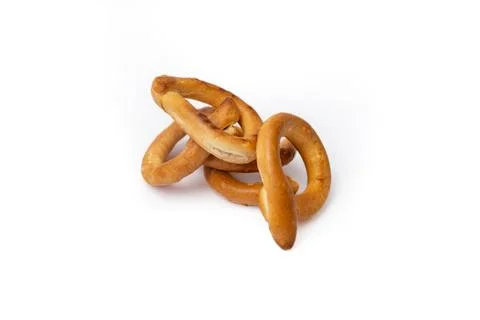 Ring shape dry pretzels stack, isolated on white background Stock Photos