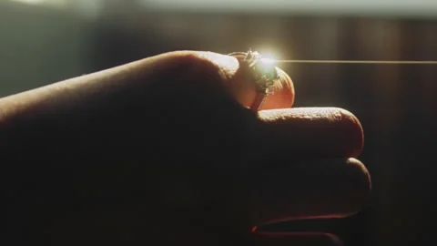 Ring shining on a woman's finger Stock Footage 274695669