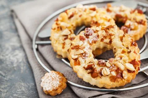 Ring shortbread cookies with peanuts on top Stock Photos