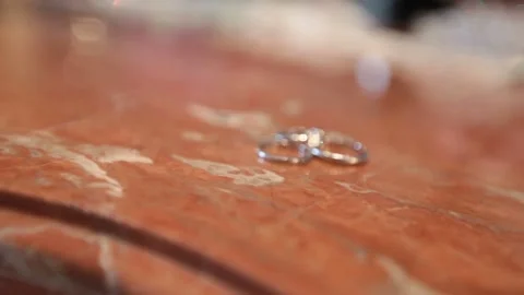 Ring wedding white bokeh diamond wedding rings. Wedding day close up Stock Footage 134355875