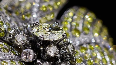 Ring with yellow diamonds, extreme close up, not 3D, it's video shooting only. Stock Footage 85875360