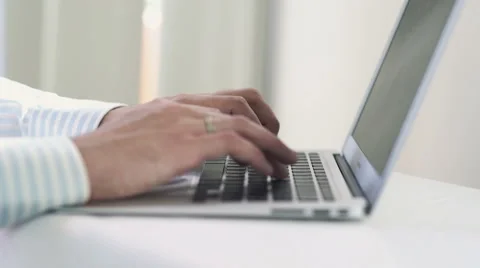 Ringed Man's hands Typing on Laptop Stock Footage 63785224