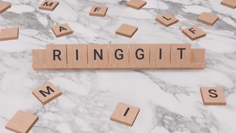 RINGGIT word written on scrabble Stock Footage 257403461