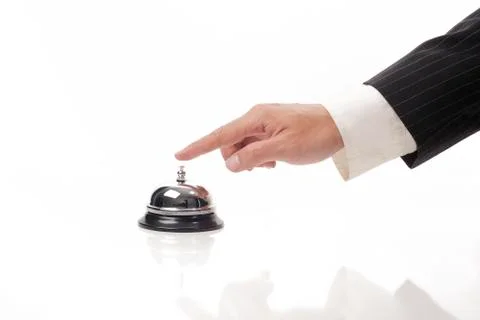 Ringing the bell to call Stock Photos