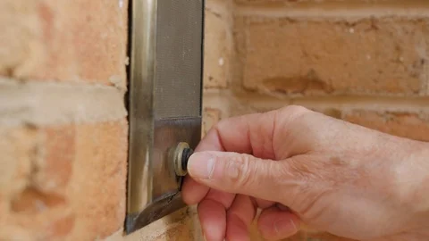 Ringing doorbell with thumb. Stockbeeldmateriaal 120751057