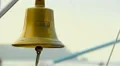 Ringing a traditional ship bell, decoration, symbol, sailing HD Footage