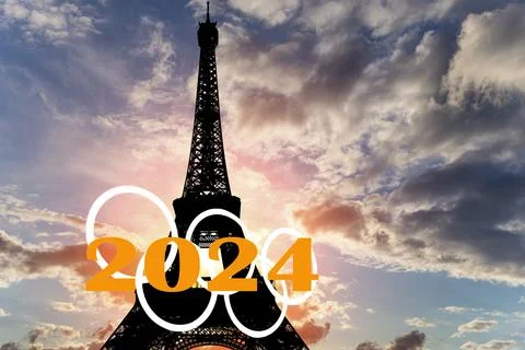Rings and Eiffel Tower against the sky at sunset. Paris, France 스톡 사진