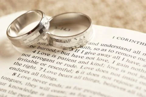 Rings on bible Stock Photos