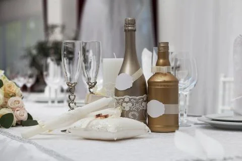 Rings, glasses and candles for wedding Stock Photos