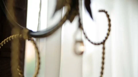 Rings hang on the sconce Stock Footage 83395228