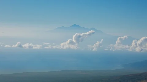 Rinjani Volcano across Wallace Line from Abang Volcano, Bali Indonesia Timelapse Stock Footage 101839249