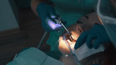 Rinse enamel surface with water using washer after ultrasonic cleaning. Video stock 104784882