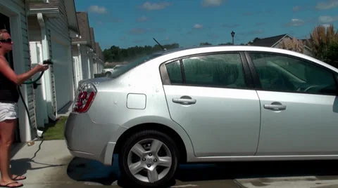 Rinsing the back of the car Stock Footage 29161770