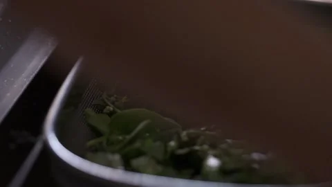 Rinsing fresh vegetable in a sink  Stock Footage 145354892