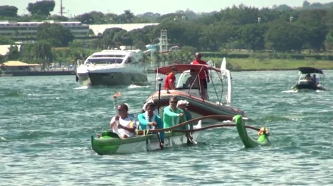 Rio 2016 torch arrive in a boat Stock Footage 62794011