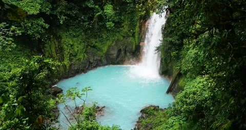 Rio Celeste waterfall  with blue turquoise water in Costa Rica Central America Stock Footage 282644688