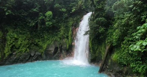 Rio Celeste waterfall  with blue turquoise water in Costa Rica Central America Stock Footage 282644690