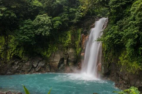 Rio Celeste waterfall in the forest Stock Photos