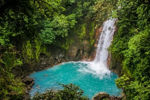 Rio Celeste waterfall in the jungle Stock Photos