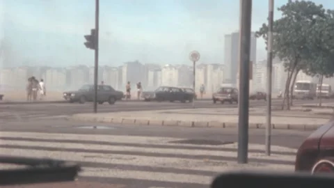 Rio de Janeiro - 1977: drivers point of view stand in queue at junction give way Stock Footage 233266312