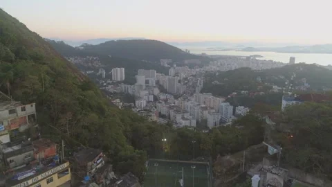 Rio de Janeiro aerial - pulling back from city and Guanabara Bay to reveal 스톡 동영상 251052395